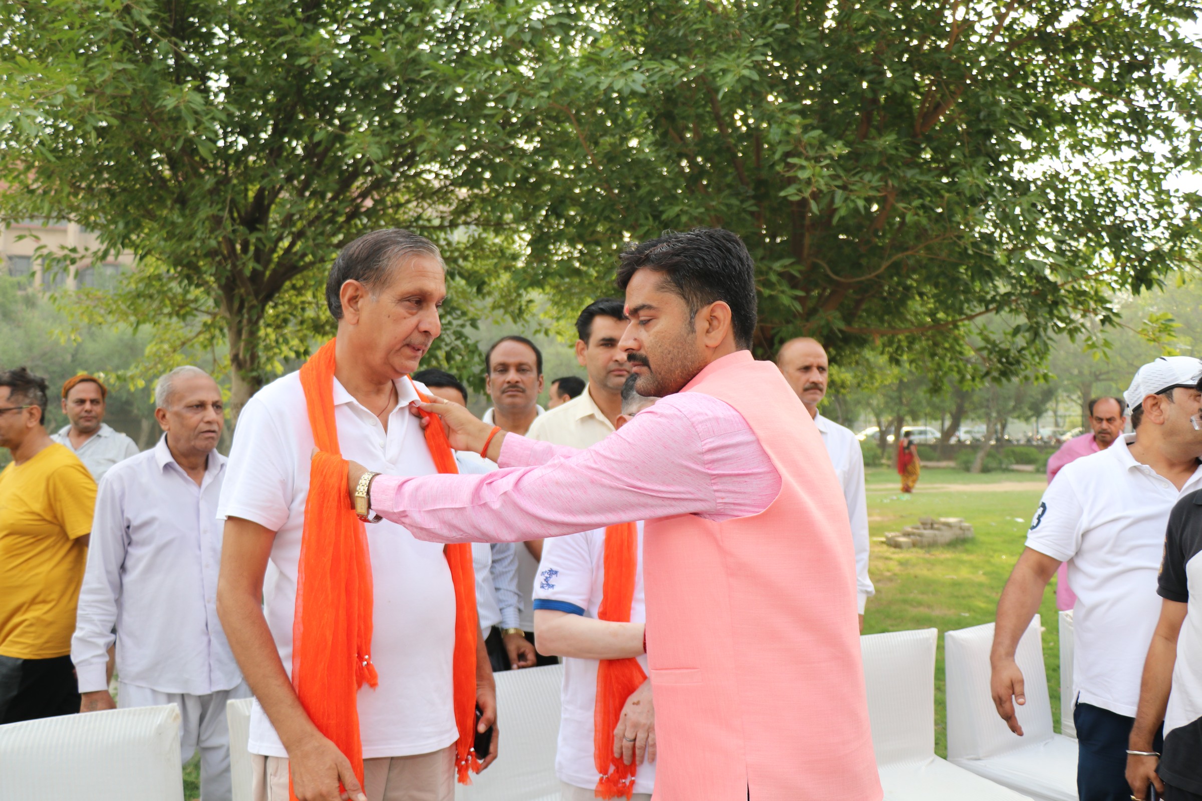 Honoring the Chief Guest with a Saffron Stole